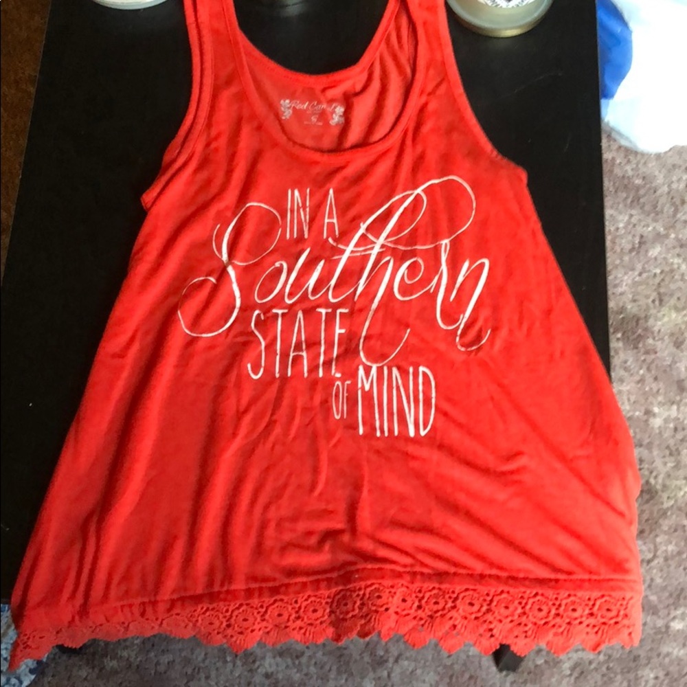 tank top , orange , writing